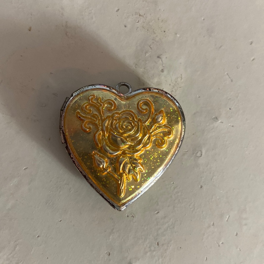 Necklace locket charm with flower design
